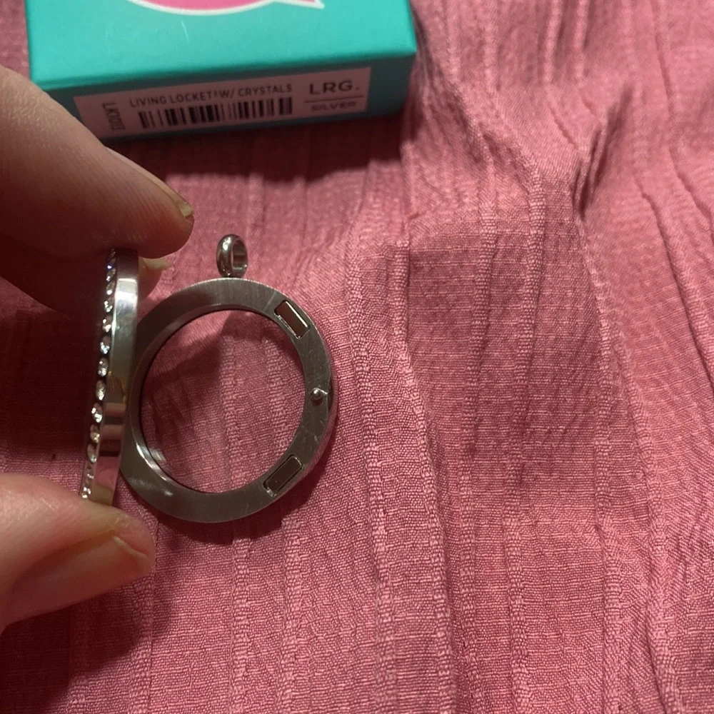 Hinged locket from origami owl.